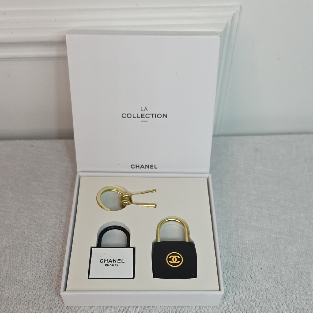 CHANEL Black and Gold Padlock Charm Set